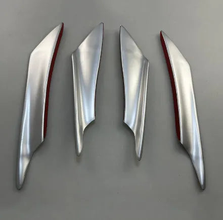 Set of four ABS plastic bumper blades for car styling in carbon fibre finish