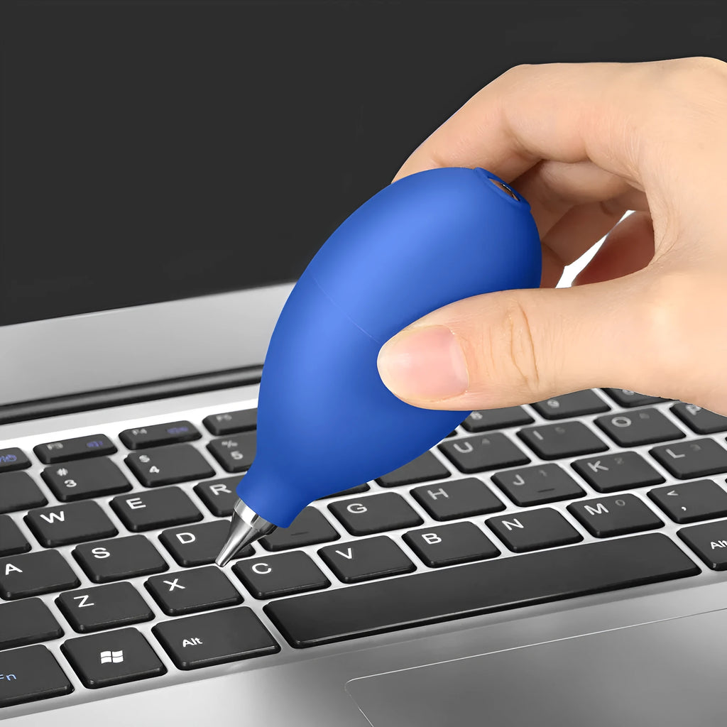 Blue rubber dust removal air blower cleaning tool for cameras and phones.