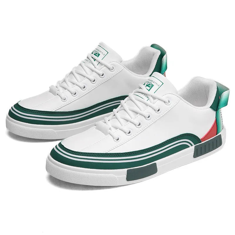 Men's white and green canvas casual shoes with mesh ventilation panels on the upper.