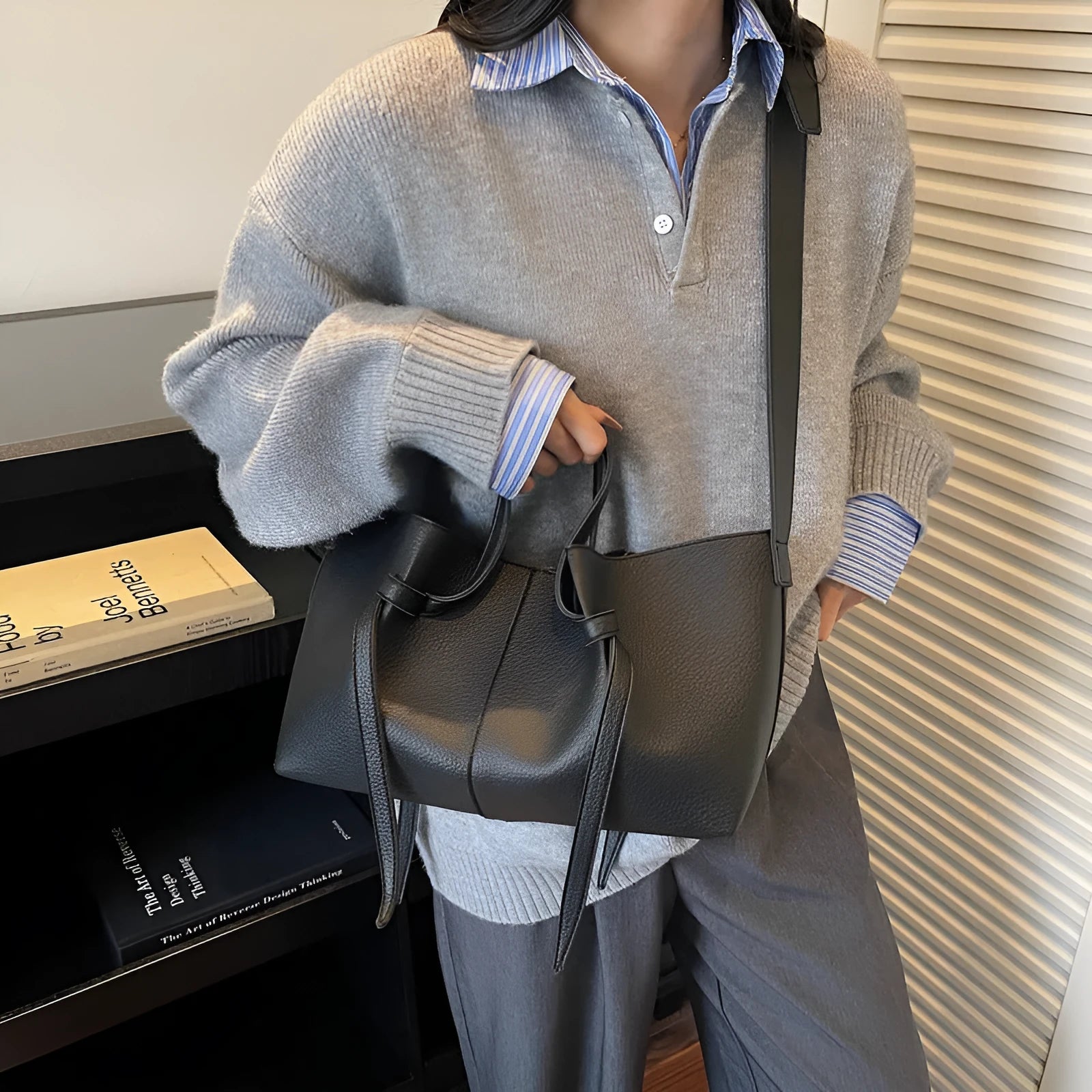 Large capacity one-shoulder crossbody bag in soft PU with sewing line detail, available in black, brown, coffee, gray