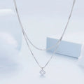 Women's sterling silver double-layer necklace with pearl chain and contemporary pendant