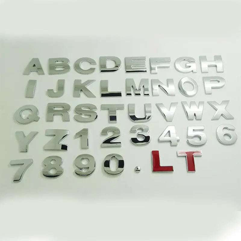 Close-up of a single 3D metal car letter sticker in zinc alloy on a vehicle bumper.