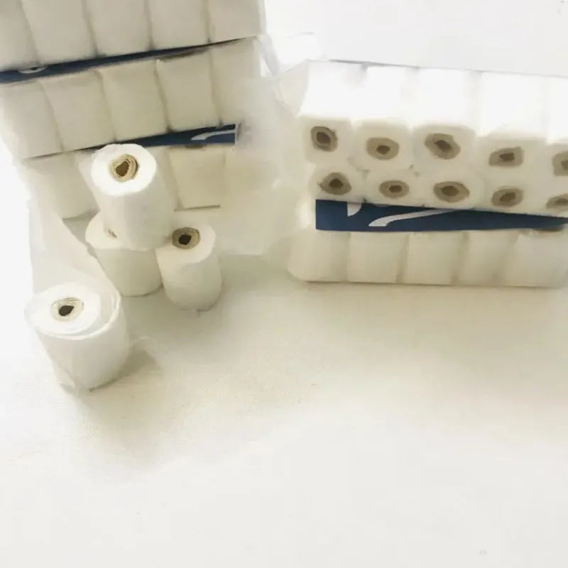 Paper simulated tissue roll model measuring 30mm wide 15mm deep 80mm tall