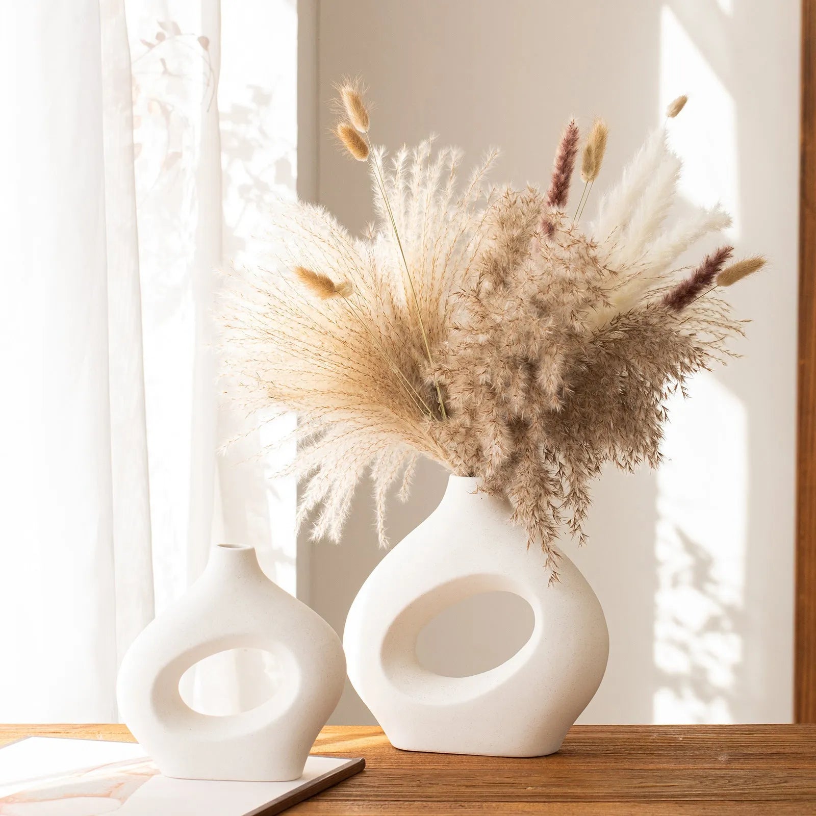 Ceramic circle vase second generation with coloured glaze finish, white large size, on a plain background