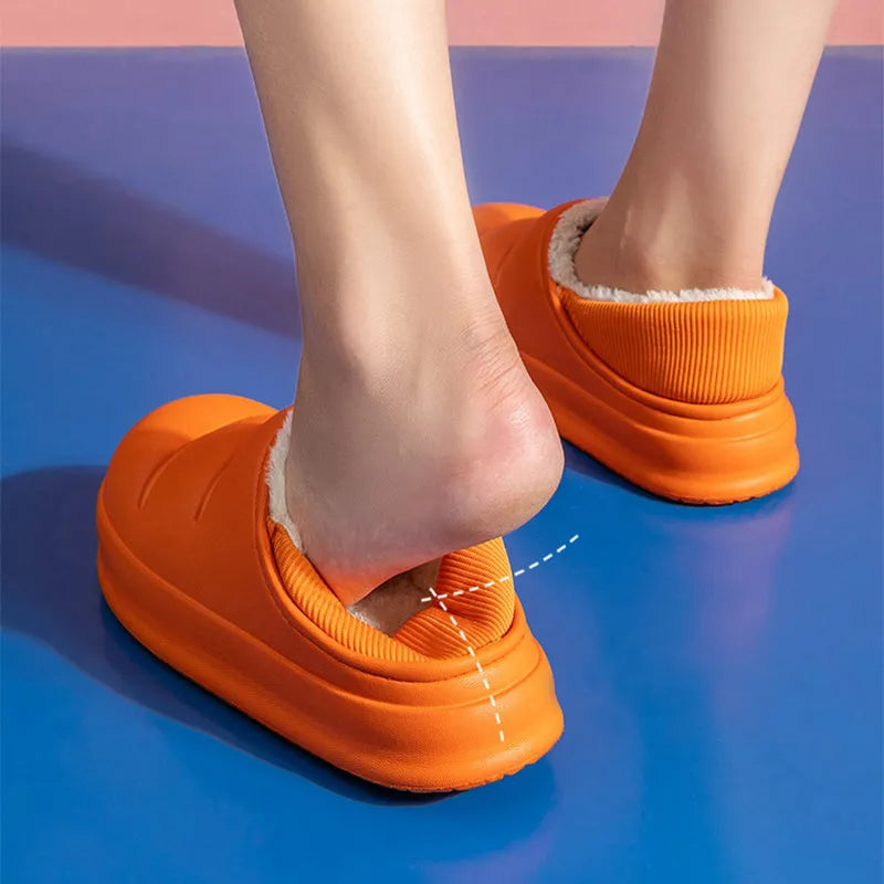 Waterproof EVA couple slippers in multiple colours with a non-slip sole and plush lining for winter.