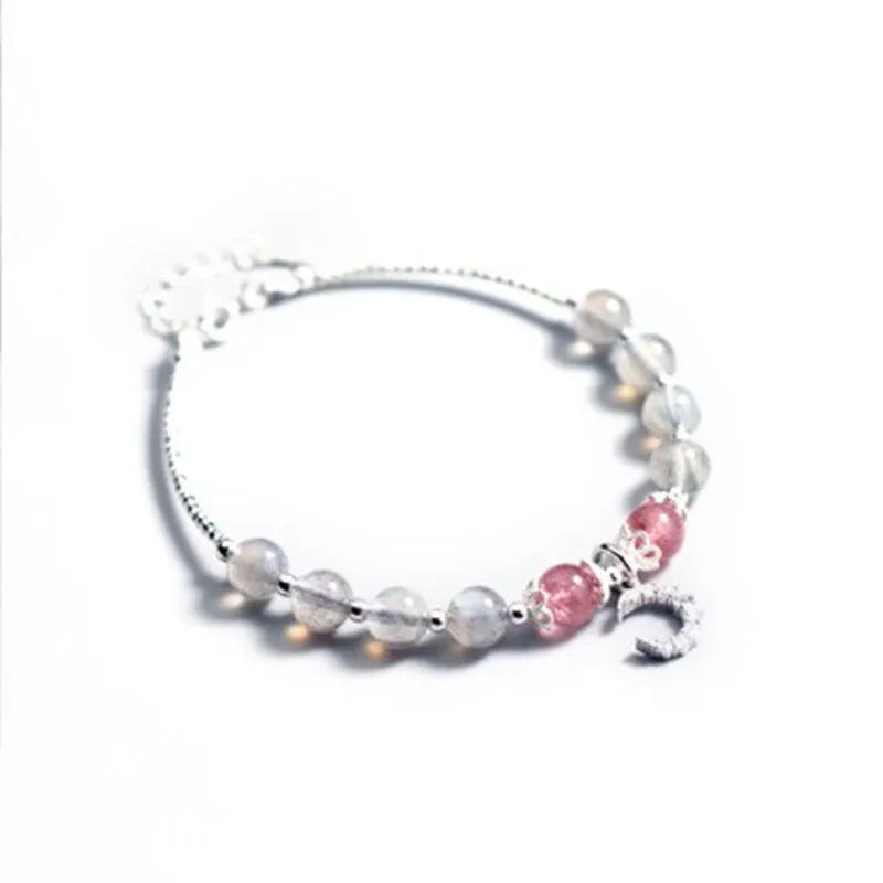 Adjustable moonstone bracelet with crescent moon charm and crystal on extension chain