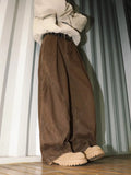 Men's pleated straight-leg trousers in black colour showing front design with micro-elastic fabric