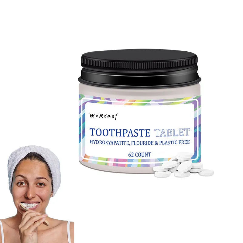 Pack of 62 white solid chewable toothpaste tablets for portable oral cleaning.