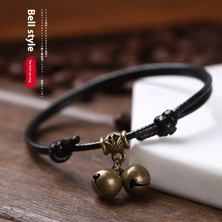 Adjustable nylon dog collar with brass bell for small dogs in black, red, or coffee colours