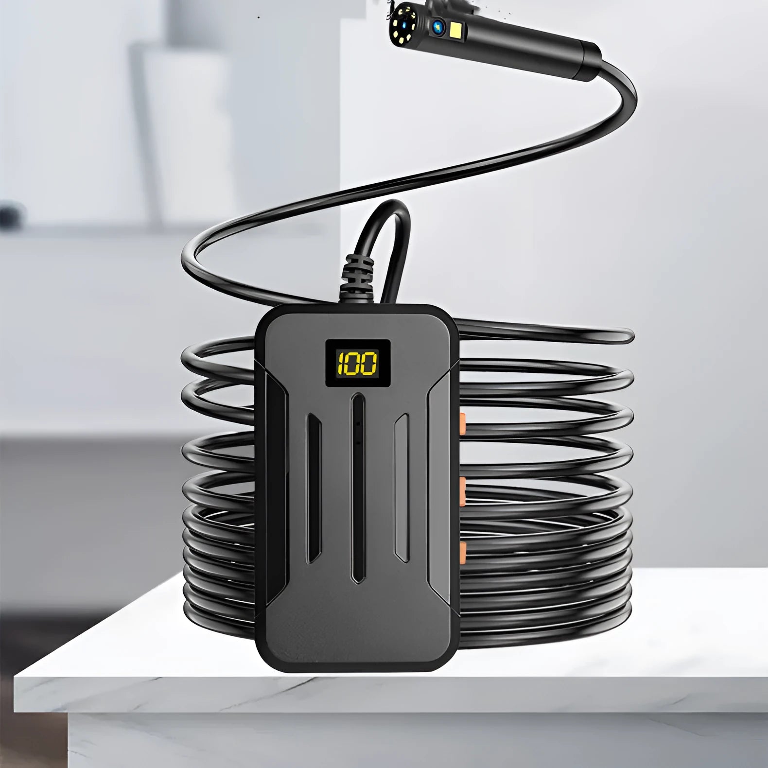 F300 wireless endoscope with dual-lens camera, hook, and magnet accessories on a smartphone displaying a live feed.