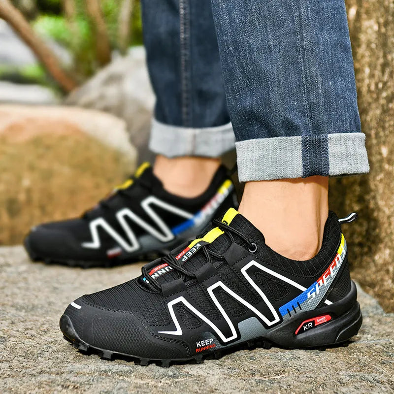 Men's low-top casual trainers in grey orange, featuring a synthetic leather upper and mesh lining.