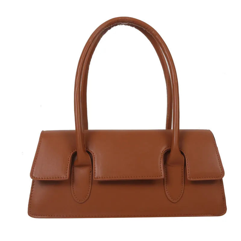 Women's retro style small square shoulder bag in four colours with adjustable strap and stitching detail