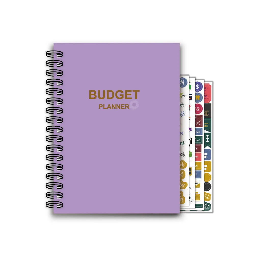 Purple coil-bound budget notebook with financial planning stickers and paper clips for monthly money management