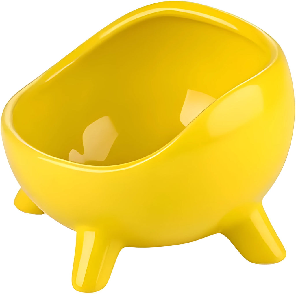 Green four-legged ceramic pet bowl for cats and small dogs on floor