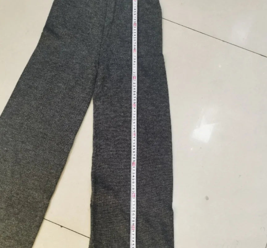 Women's long-sleeved acrylic sweater and matching trousers suit set in solid colour