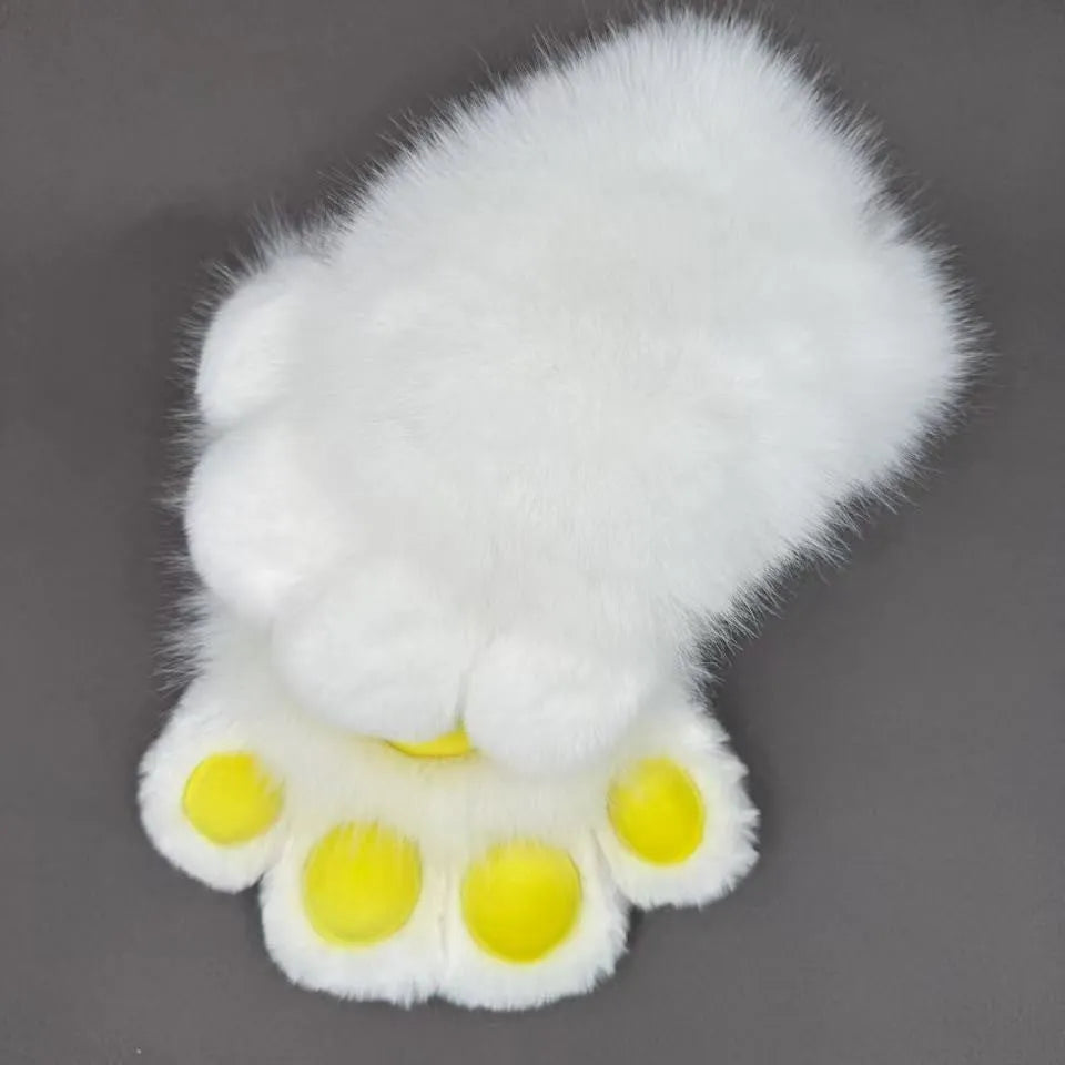 A pair of fingerless animal claw cosplay gloves in a white and pink colour combination with a coloured pad on the back.