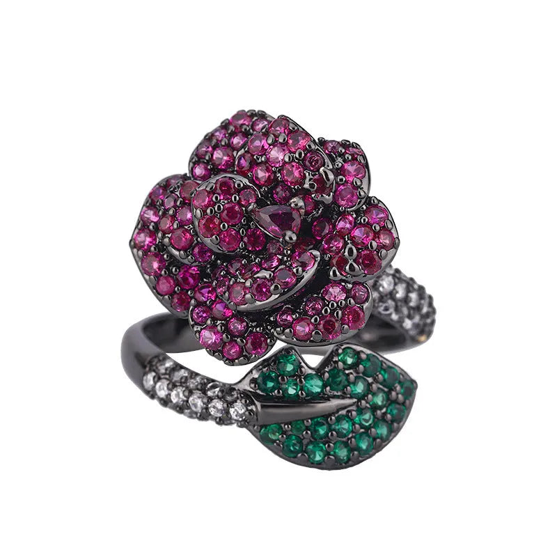Gold-plated black gold ring with geometric shape and floral design featuring simulation red corundum elements
