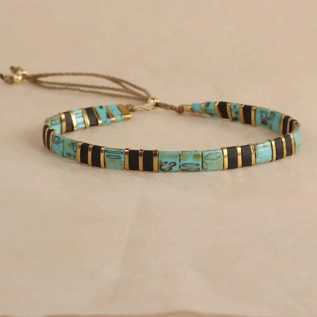 Geometric glass and coloured glaze beaded bracelet with round elements in five colour options