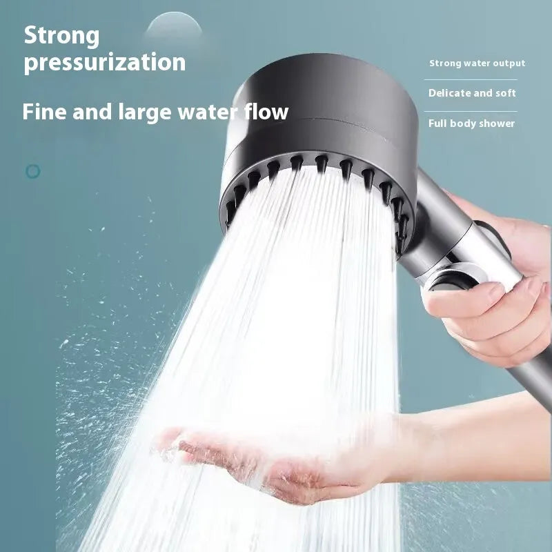 Portable white ABS shower head with a modern simple design and three-gear adjustment dial.
