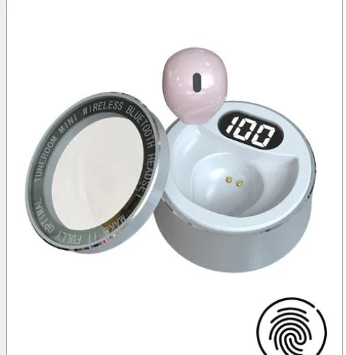 Close-up of a small 9mm skin tone Bluetooth earpiece designed to be invisible in the ear.