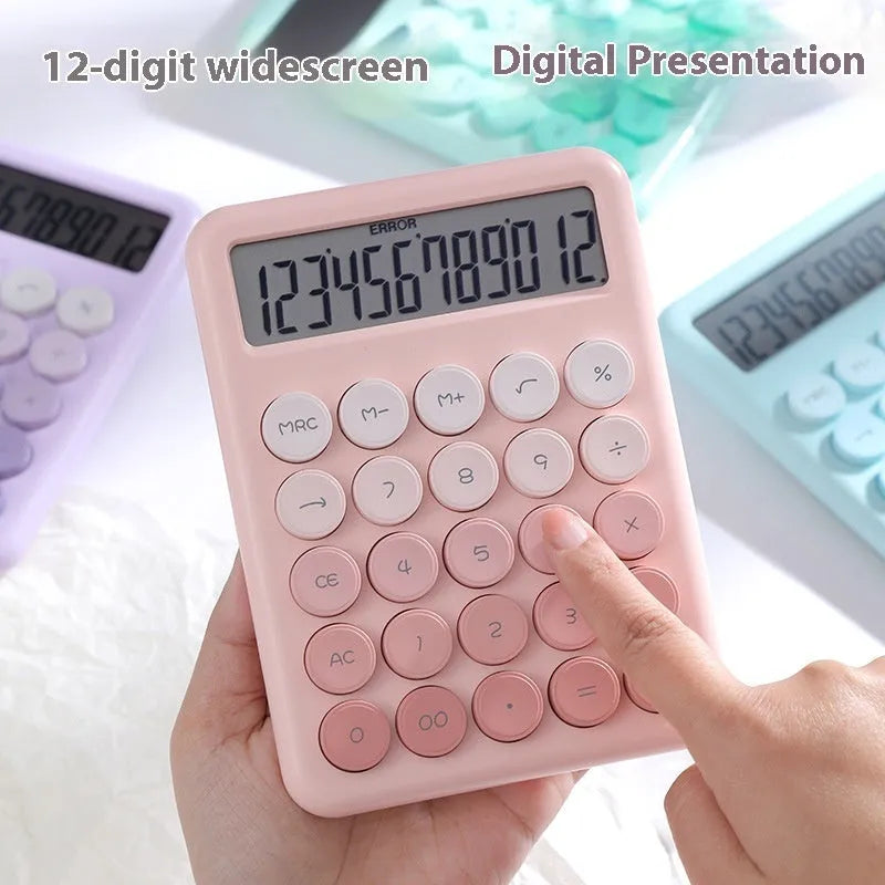 Gradient colour desktop calculator in four colour options on desk