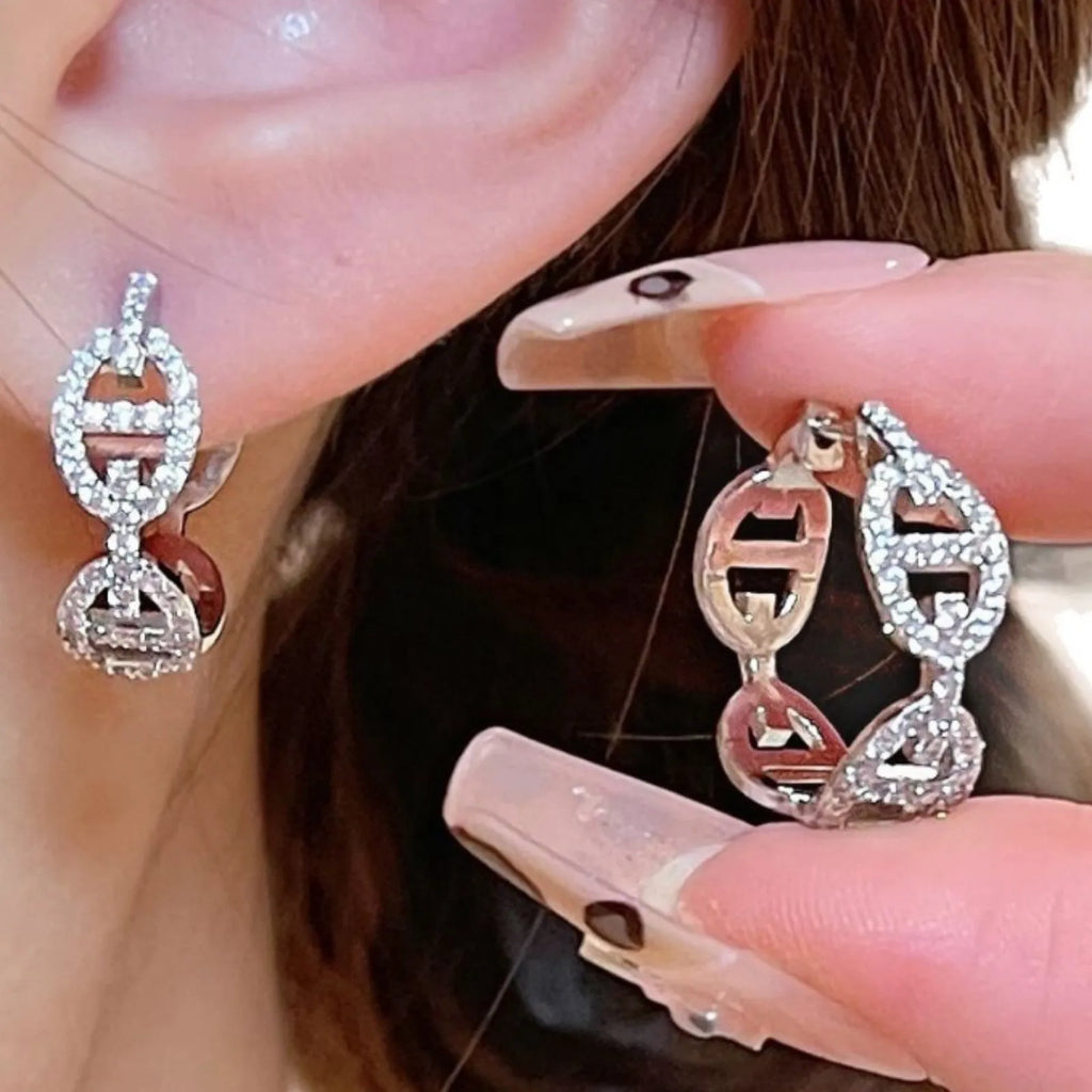 Ladies diamond detail earrings in silver, gold, and rose gold electroplated finishes