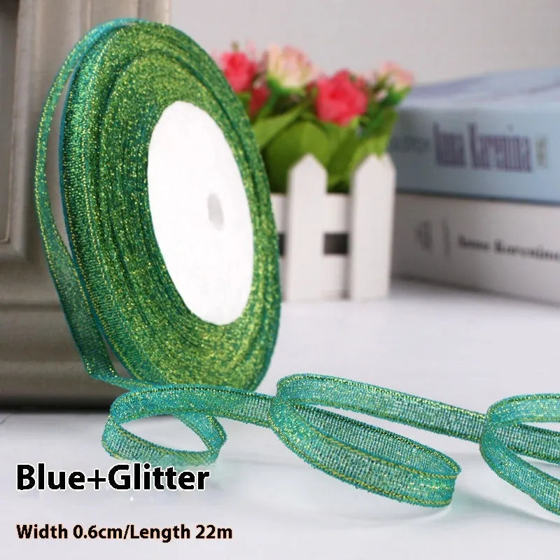 Roll of narrow 0.6cm wide polyester decorative ribbon in multiple colour options including metallic finishes