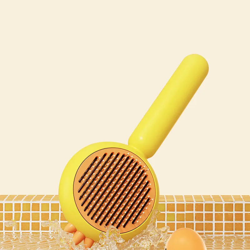 Purple self-cleaning pet grooming brush with stainless steel bristles