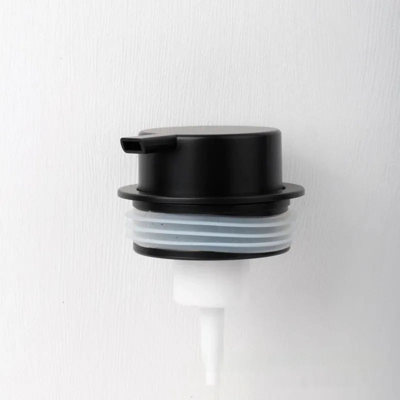 ABS plastic foam pump dispenser with large push head in metallic and matte black finishes.