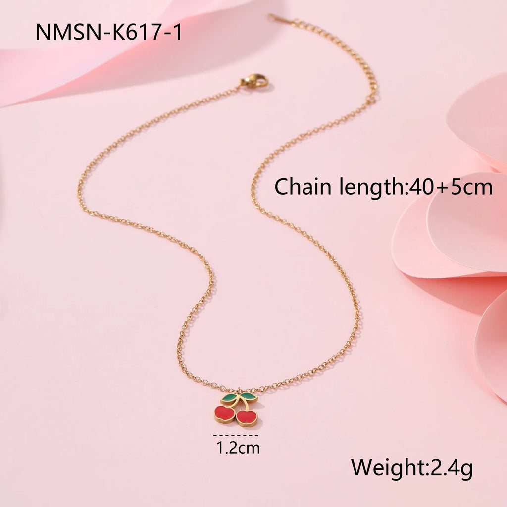 Stainless steel cherry jewellery set with necklace, bracelet, earrings, and ring in golden electroplated finish