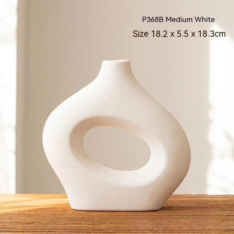Ceramic circle vase second generation with coloured glaze finish, white large size, on a plain background