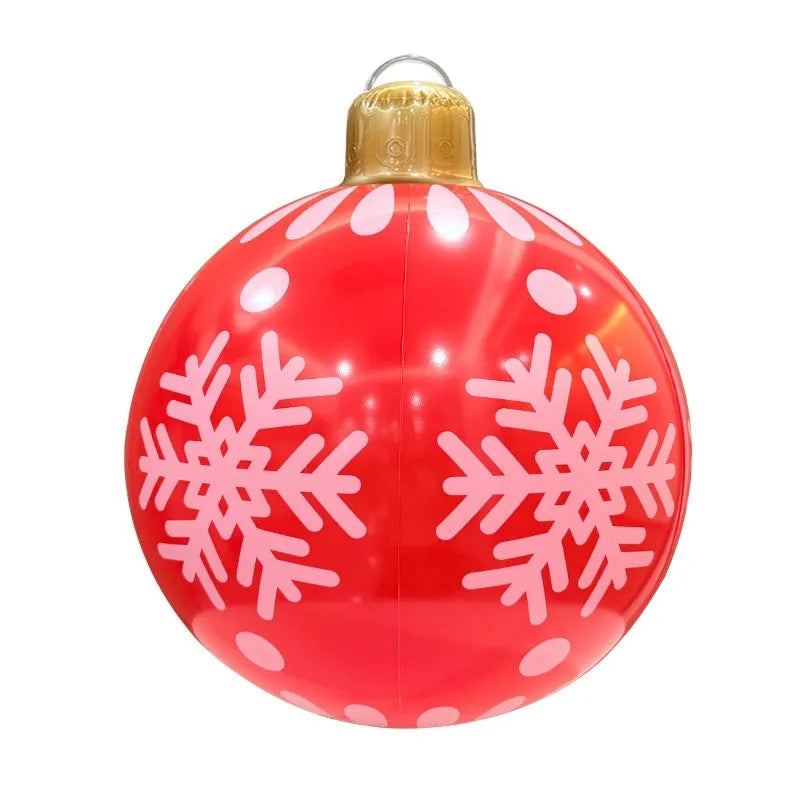 Large red inflatable Christmas ball with flash lights, shown with manual pump, for garden decoration.