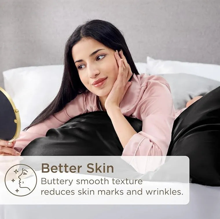 A pair of solid colour satin pillowcases in various shades on a bed.