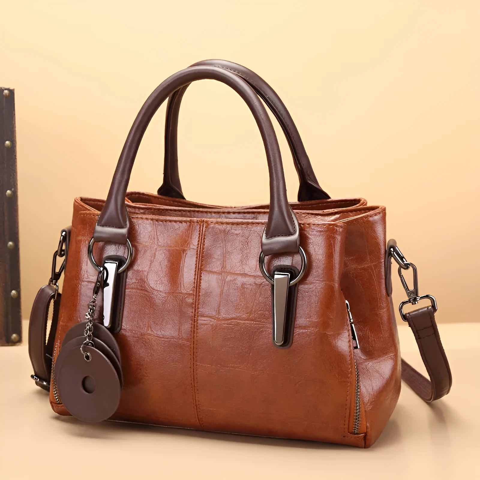 Horizontal square PU leather shoulder bag with contrasting sewing thread detail and organised interior compartments