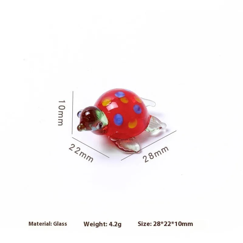 Glass turtle ornament with geometric modern design in six colour variations for desktop decoration