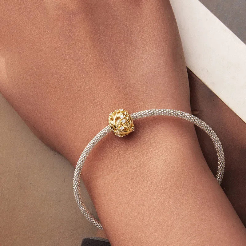S925 sterling silver plated 14k golden leaf bead with 0.45cm aperture on white background