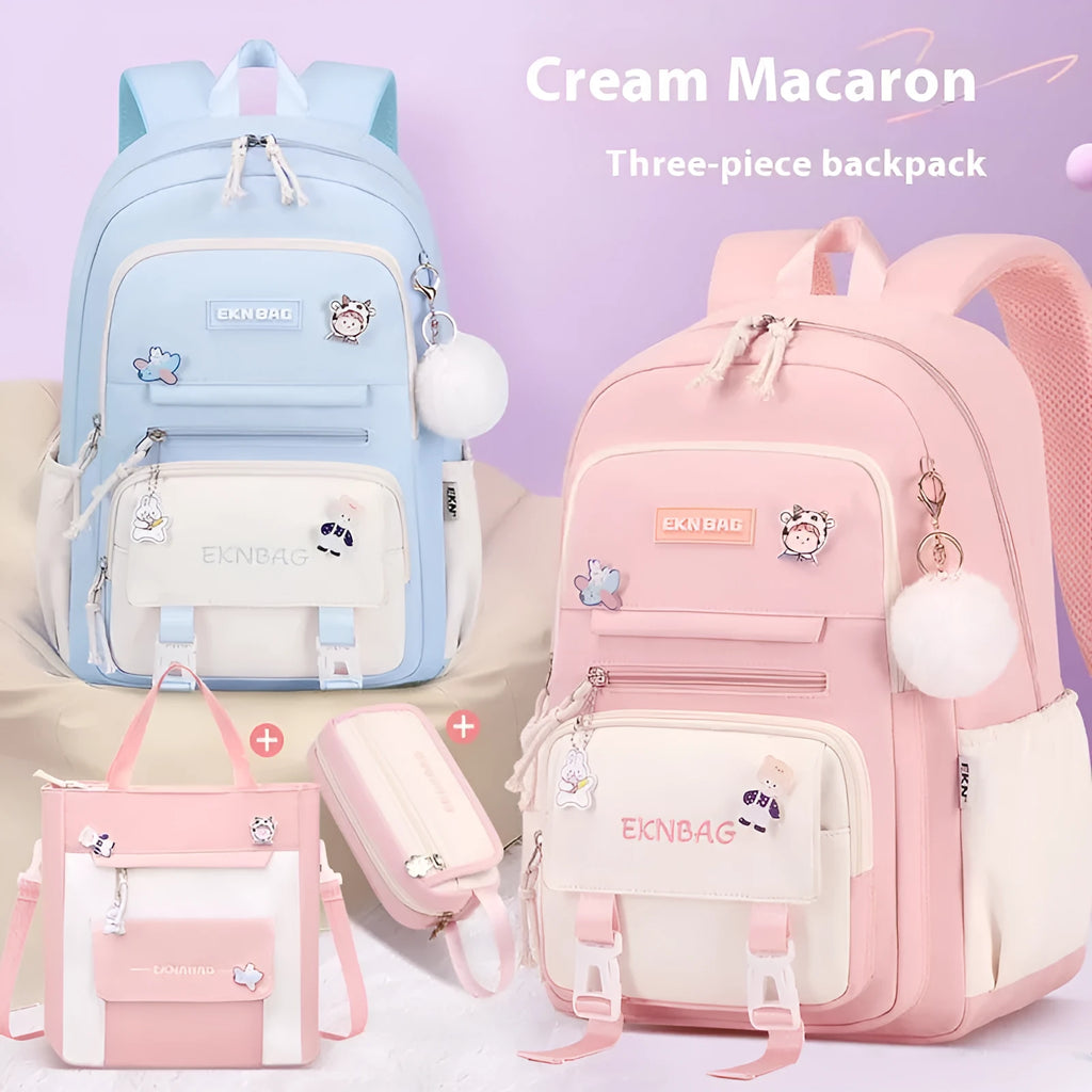Pink waterproof school backpack for girls with curved straps, shown with matching pencil case and bag.
