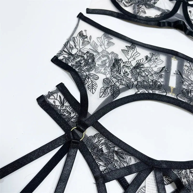 Black lace three-piece set with sleeveless top, high-waist trousers, and waist ring for women