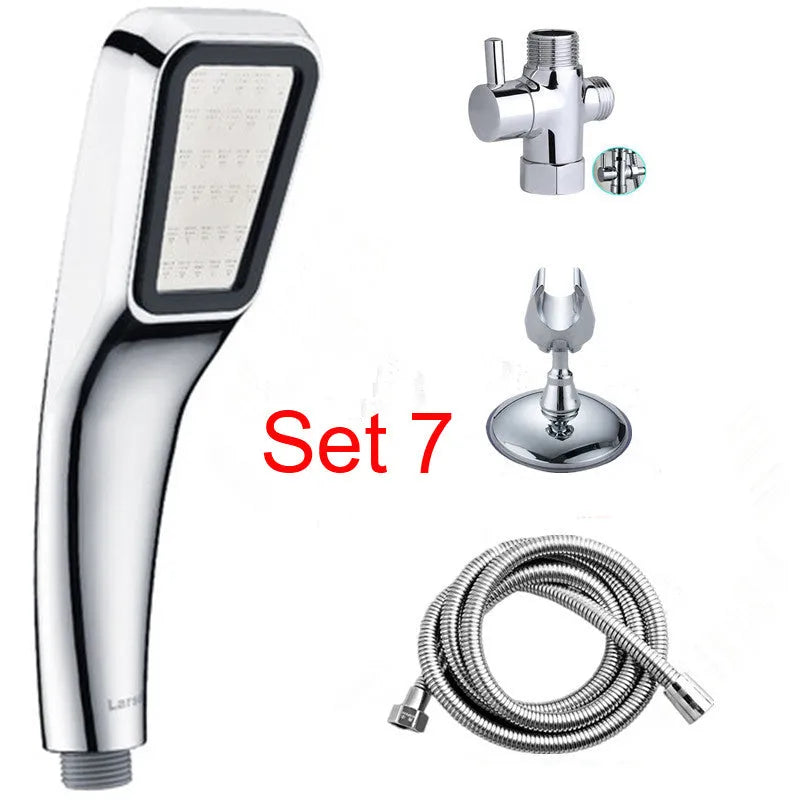 Orange hand-held pressurised shower head with rain function, part of a complete shower set