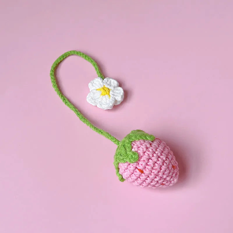 Wool crochet strawberry pendant necklace measuring 35cm with pink or red charm option