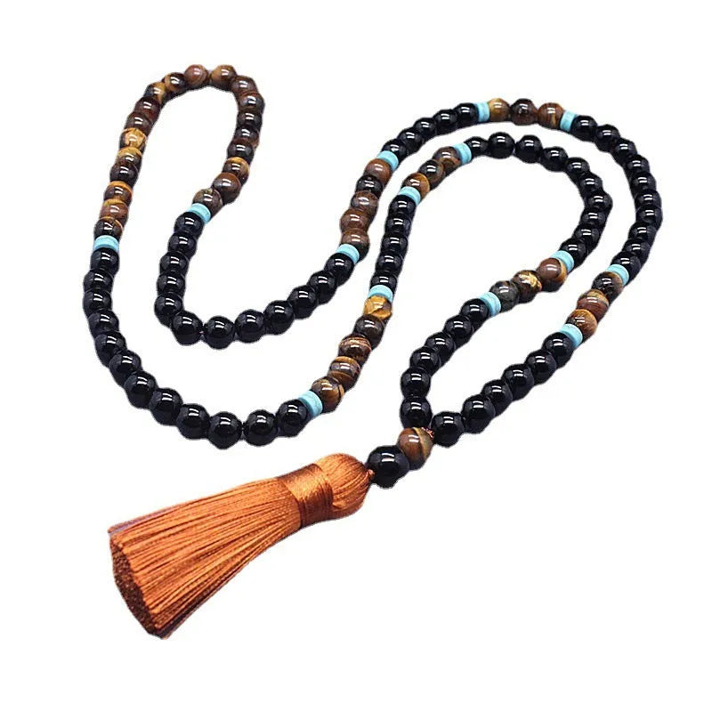 Natural agate and tigereye bead jewellery set showing black agate bracelet and necklace with tiger-shaped stone.