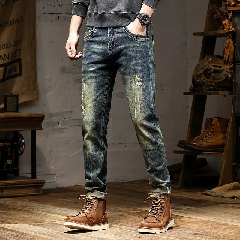 Men's retro blue stretch denim jeans with zip fly, shown in a slim-fit style