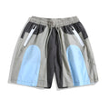 Blue patchwork men's sports shorts with elastic waistband and straight-leg design