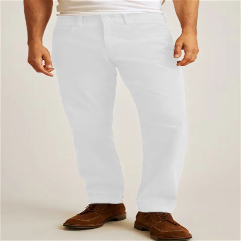 Corduroy straight-leg trousers in green displayed flat showing mid-waist design and zip fly