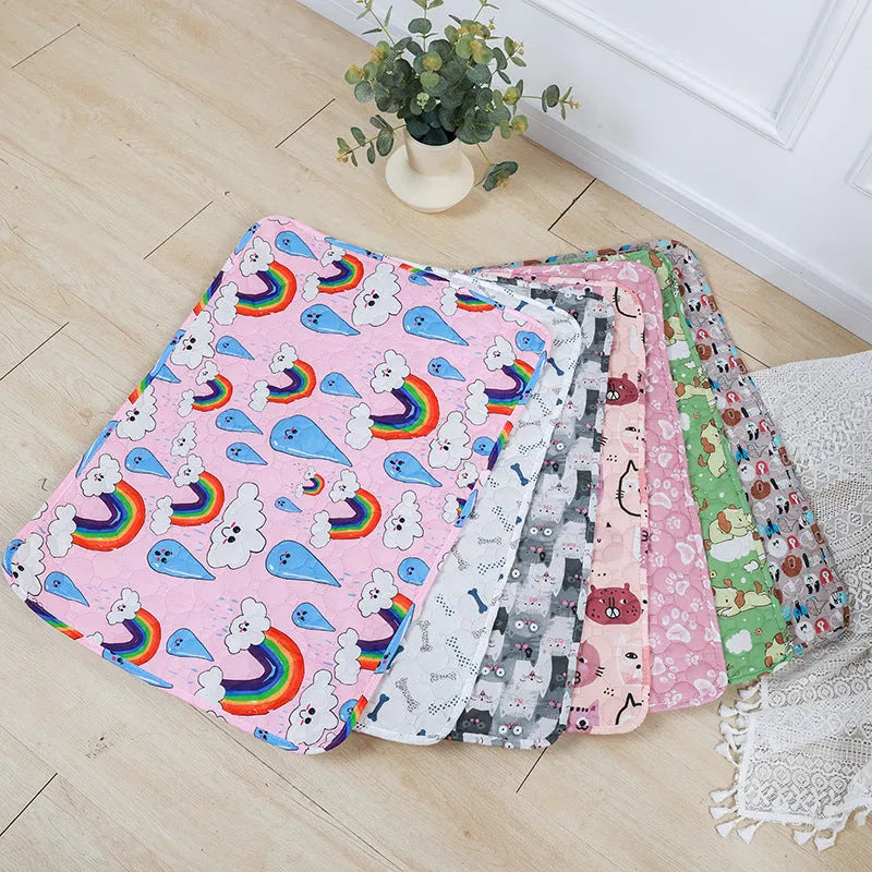Reusable waterproof pet training pad in animal print design on a wooden floor.