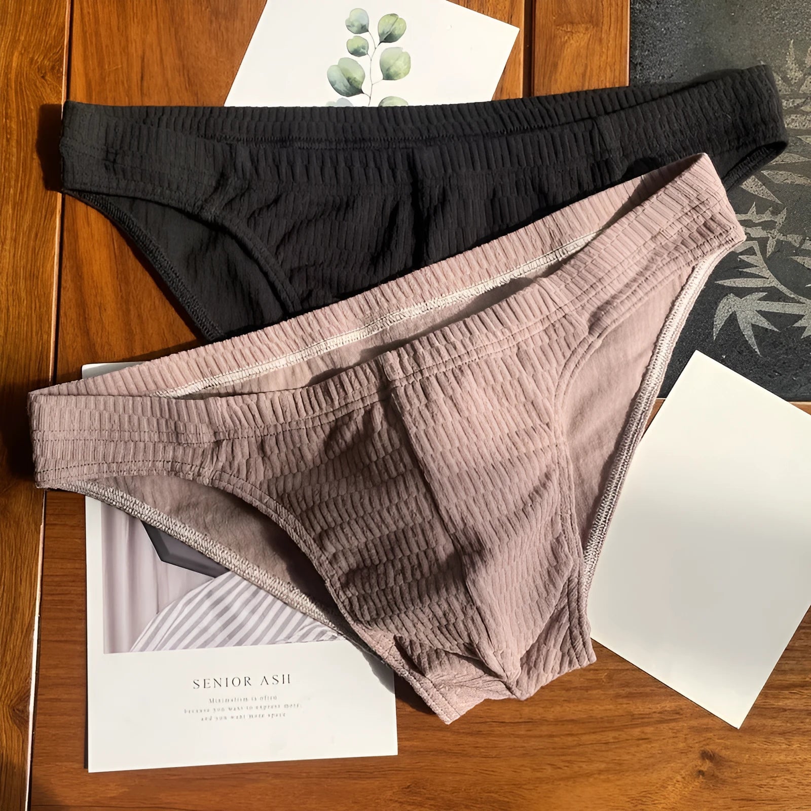 Men's solid colour cotton triangle underwear briefs on a mid-waist, shown in a skin tone colour.