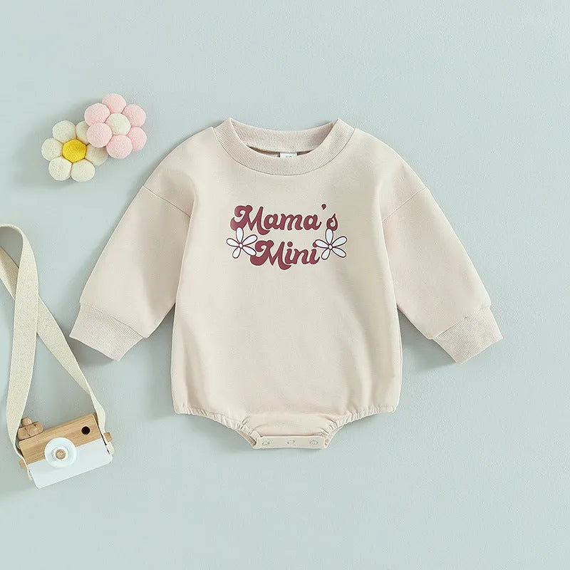 Girls' long-sleeved cotton top with letter flower print in apricot, hide hook closure, front view
