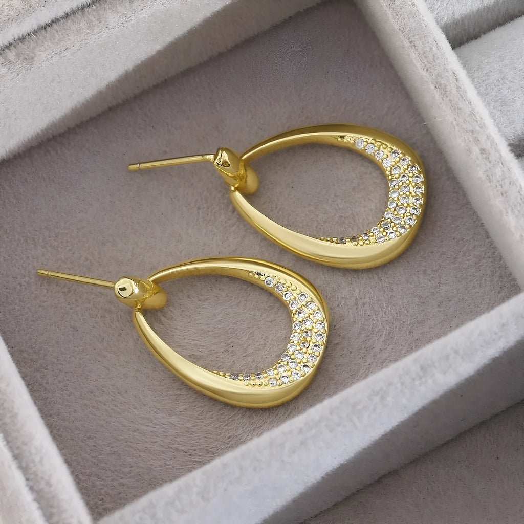 Yellow gold geometric drop earrings with zircon accents, measuring 2.6cm long by 1.7cm wide