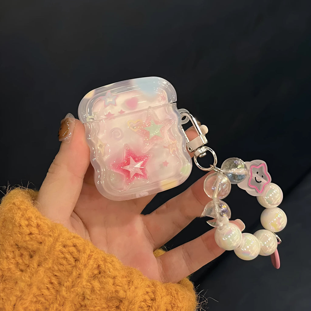 Pink transparent silicone AirPods case with gradual change star pattern and star hand rope