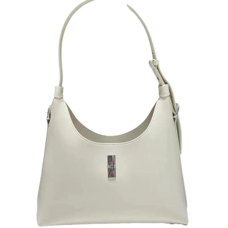 Genuine leather dumpling-shaped crossbody bag in apricot colour with shoulder strap